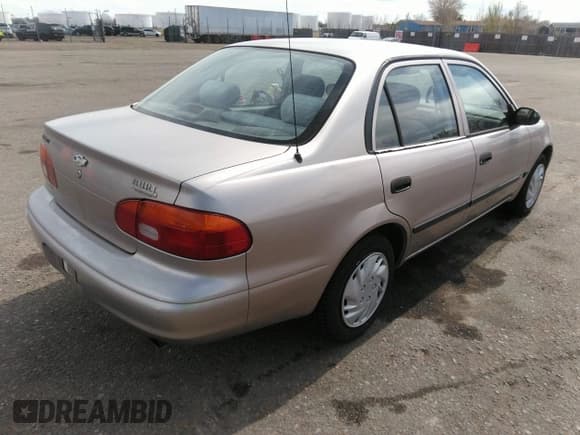 ✅ 1998 Chevrolet Prizm Lsi • VIN: 1Y1SK5285WZ438757 • Lot: 41896020. Listed on IAAI with 106,369 mi. Free auction sales archive from the USA and detailed vehicle history report at DreamBid. Image 4.