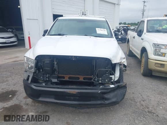 ✅ 2014 Ram 1500 Tradesman • VIN: 3C6JR7DT9EG280888 • Lot: 42398739. Listed on IAAI with 127,656 mi. Free auction sales archive from the USA and detailed vehicle history report at DreamBid. Image 12.