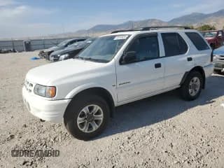 ✅ 2001 Isuzu Rodeo S • VIN: 4S2DM58W014312281 • Lot: 69132835. Wystawiony na Copart z przebiegiem 220 306 mil. Bezpłatny archiwum sprzedaży aukcyjnych z USA i szczegółowy raport historii pojazdu na DreamBid. Zdjęcie 1.