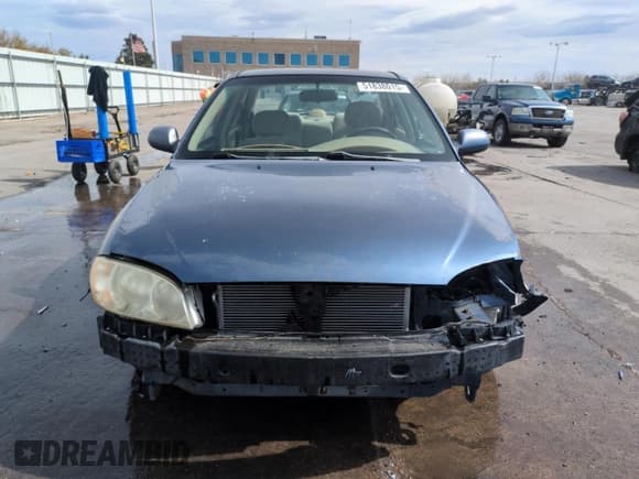 ✅ 2002 Kia Spectra • VIN: KNAFB121025197433 • Lot: 51838015. Listed on Copart with 209,660 mi. Free auction sales archive from the USA and detailed vehicle history report at DreamBid. Image 5.