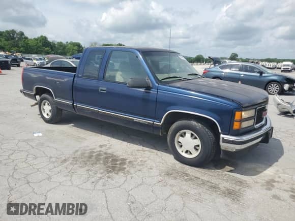 ✅ 1999 GMC Sierra 1500 • VIN: 1GTEC19MXXR505798 • Lot: 55609605. Listed on Copart with 135,309 mi. Free auction sales archive from the USA and detailed vehicle history report at DreamBid. Image 4.