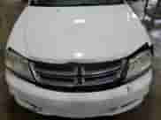 2014 Dodge Avenger SE z VIN 1C3CDZABXEN168717, wystawiony jako Copart lot #73149894 z przebiegiem 121 203 mil mil oraz Szkoda całkowita • Salvage title. Historia ofert i sprzedaży dostępna na DreamBid. Obrazek 11.