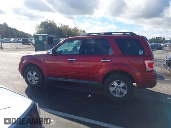 ✅ 2009 Ford Escape XLT • VIN: 1FMCU03789KA07673 • Lot: 43577512. Listed on IAAI with 197,812 mi. Free auction sales archive from the USA and detailed vehicle history report at DreamBid. Image 14.