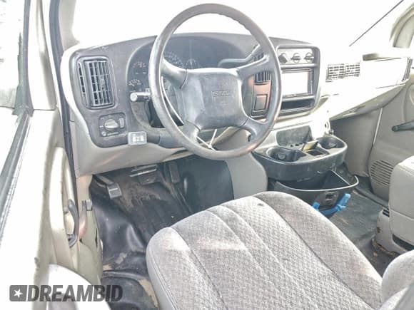 ✅ 2001 GMC Savana • VIN: 1GTFG25M811903859 • Lot: 94085855. Listed on Copart with 128,185 mi. Free auction sales archive from the USA and detailed vehicle history report at DreamBid. Image 8.