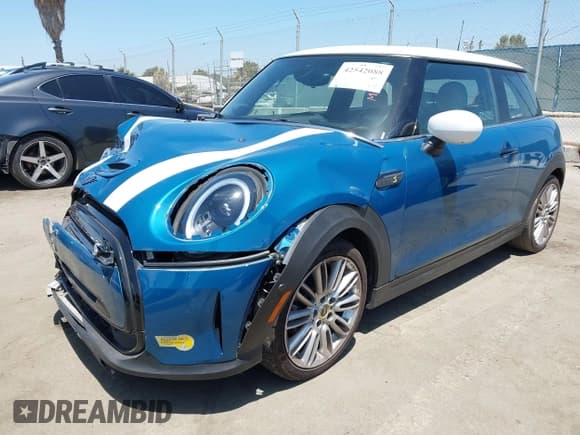 ✅ 2023 MINI Hardtop Cooper SE • VIN: WMW13DJ07P2S73739 • Lot: 42542088. Listed on IAAI with 16,344 mi. Free auction sales archive from the USA and detailed vehicle history report at DreamBid. Image 2.