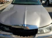 ✅ 1998 Lincoln Town Car Signature • VIN: 1LNFM82W7WY614094 • Lot: 59792735. Listed on Copart with 183,045 mi. Free auction sales archive from the USA and detailed vehicle history report at DreamBid. Image 11.