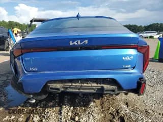 ✅ 2025 Kia K4 GT-Line • VIN: 3KPFW4DE5SE054507 • Lot: 64839595. Wystawiony na Copart z przebiegiem 14 450 mil. Bezpłatny archiwum sprzedaży aukcyjnych z USA i szczegółowy raport historii pojazdu na DreamBid. Zdjęcie 6.