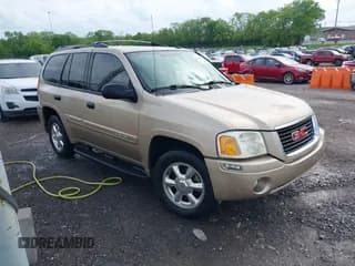 ✅ 2005 GMC Envoy SLT • VIN: 1GKDS13S452141376 • Lot: 42095025. Wystawiony na IAAI z przebiegiem 198 911 mil. Bezpłatny archiwum sprzedaży aukcyjnych z USA i szczegółowy raport historii pojazdu na DreamBid. Zdjęcie 1.