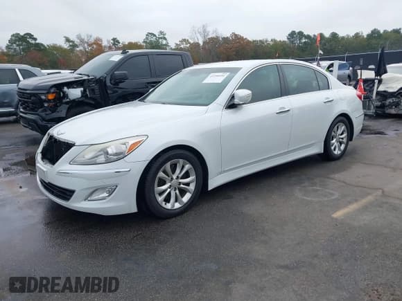 ✅ 2013 Hyundai Genesis 3.8L • VIN: KMHGC4DD7DU244152 • Lot: 43750491. Listed on IAAI with 185,089 mi. Free auction sales archive from the USA and detailed vehicle history report at DreamBid. Image 2.