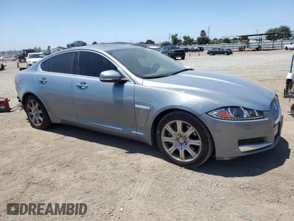✅ 2013 Jaguar XF RWD • VIN: SAJWA0E77D8S91277 • Lot: 63109595. Listed on Copart with 81,735 mi. Free auction sales archive from the USA and detailed vehicle history report at DreamBid. Image 4.