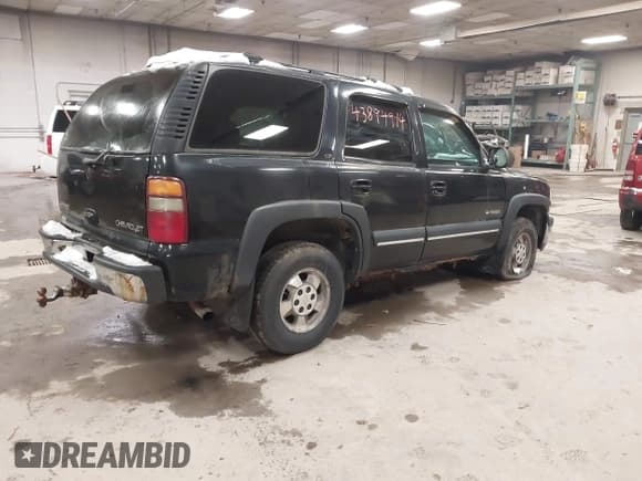 ✅ 2002 Chevrolet Tahoe LT • VIN: 1GNEK13Z72J242434 • Lot: 43894914. Listed on IAAI with 307,748 mi. Free auction sales archive from the USA and detailed vehicle history report at DreamBid. Image 4.