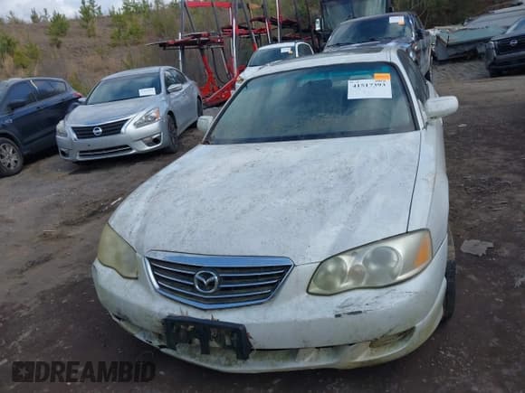 ✅ 2001 Mazda Millenia • VIN: JM1TA221211708077 • Lot: 41517393. Wystawiony na IAAI z przebiegiem 269 771 mil. Bezpłatny archiwum sprzedaży aukcyjnych z USA i szczegółowy raport historii pojazdu na DreamBid. Zdjęcie 6.