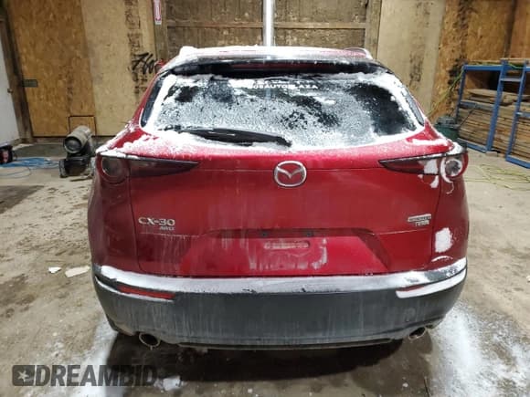 ✅ 2022 Mazda CX-30 2.5 Turbo • VIN: 3MVDMBAY8NM403877 • Lot: 44189095. Listed on Copart with 49,692 mi. Free auction sales archive from the USA and detailed vehicle history report at DreamBid. Image 6.