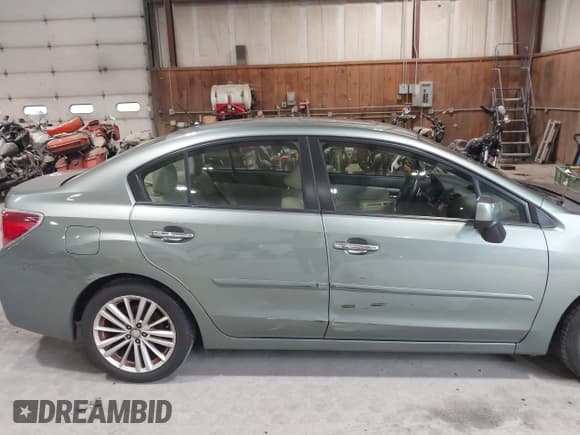 ✅ 2014 Subaru Impreza Limited • VIN: JF1GJAG69EH021682 • Lot: 42514563. Wystawiony na IAAI z przebiegiem 73 442 mil. Bezpłatny archiwum sprzedaży aukcyjnych z USA i szczegółowy raport historii pojazdu na DreamBid. Zdjęcie 17.