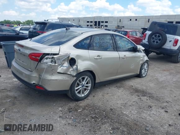 ✅ 2018 Ford Focus SE • VIN: 1FADP3FE2JL311761 • Lot: 42599206. Listed on IAAI with 71,655 mi. Free auction sales archive from the USA and detailed vehicle history report at DreamBid. Image 4.