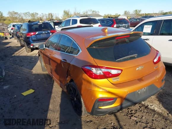 2017 Chevrolet Cruze Premier z VIN 3G1BF6SM6HS540153, wystawiony jako IAAI lot #43391698 z przebiegiem 115 761 mil mil oraz . Historia ofert i sprzedaży dostępna na DreamBid. Obrazek 3.