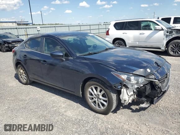 ✅ 2015 Mazda 3 i Touring • VIN: 3MZBM1V71FM129988 • Лот: 70320685. Опубликован ранее на Copart с пробегом 219 954 миль. Бесплатный доступ к архиву аукционных продаж из США и подробный отчёт об истории автомобиля на DreamBid. Изображение 4.