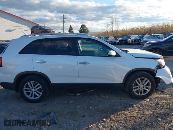 ✅ 2014 Kia Sorento LX • VIN: 5XYKT4A6XEG517687 • Лот: 43676103. Опубликован ранее на IAAI с пробегом 186 176 миль. Бесплатный доступ к архиву аукционных продаж из США и подробный отчёт об истории автомобиля на DreamBid. Изображение 13.