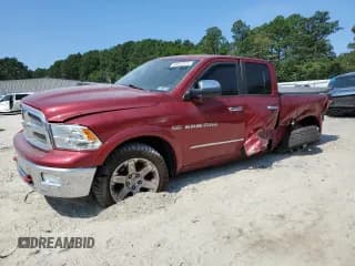 ✅ 2012 Ram 1500 Laramie • VIN: 1C6RD7JT7CS285521 • Лот: 66032875. Опубликован ранее на Copart с пробегом 143 555 миль. Бесплатный доступ к архиву аукционных продаж из США и подробный отчёт об истории автомобиля на DreamBid. Изображение 1.