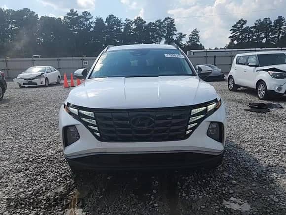 2023 Hyundai Tucson Blue z VIN KM8JBCA17PU085733, wystawiony jako Copart lot #71896115 z przebiegiem 79 430 mil mil oraz Szkoda całkowita • Salvage title. Historia ofert i sprzedaży dostępna na DreamBid. Obrazek 13.