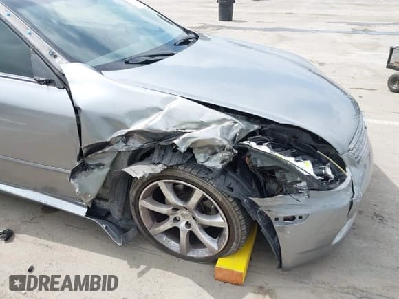 ✅ 2004 Infiniti G35 w/Leather • VIN: JNKCV54E74M819148 • Lot: 42497839. Wystawiony na IAAI z przebiegiem 129 503 mil. Bezpłatny archiwum sprzedaży aukcyjnych z USA i szczegółowy raport historii pojazdu na DreamBid. Zdjęcie 6.