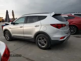 ✅ 2017 Hyundai Santa Fe 2.4L • VIN: 5XYZU3LB2HG451169 • Лот: 54615084. Опубликован ранее на Copart с пробегом 87 202 миль. Бесплатный доступ к архиву аукционных продаж из США и подробный отчёт об истории автомобиля на DreamBid. Изображение 2.