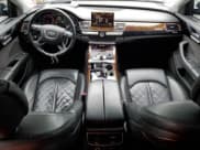 ✅ 2016 Audi A8 Sport • VIN: WAU43AFD2GN005719 • Лот: 60746275. Опубликован ранее на Copart с пробегом 125 802 миль. Бесплатный доступ к архиву аукционных продаж из США и подробный отчёт об истории автомобиля на DreamBid. Изображение 8.