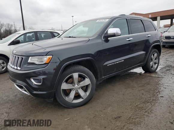 ✅ 2015 Jeep Grand Cherokee Overland • VIN: 1C4RJFCM5FC847707 • Lot: 86420784. Listed on Copart with 124,300 mi. Free auction sales archive from the USA and detailed vehicle history report at DreamBid. Image 1.