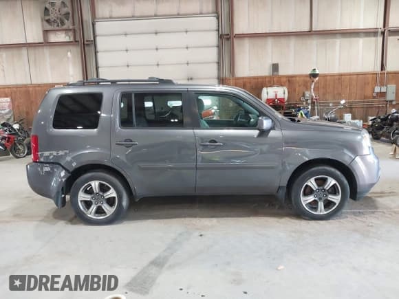 ✅ 2015 Honda Pilot SE • VIN: 5FNYF4H32FB046446 • Lot: 42995806. Listed on IAAI with 137,831 mi. Free auction sales archive from the USA and detailed vehicle history report at DreamBid. Image 13.