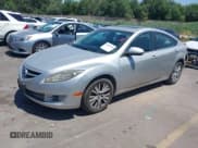 ✅ 2010 Mazda 6 i Touring • VIN: 1YVHZ8CH1A5M13309 • Lot: 42699710. Listed on IAAI with 107,618 mi. Free auction sales archive from the USA and detailed vehicle history report at DreamBid. Image 2.