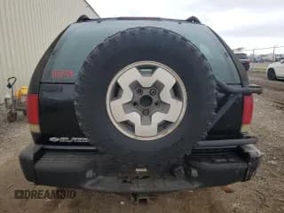 ✅ 2003 Chevrolet Blazer LS • VIN: 1GNCT18X23K154091 • Lot: 41507405. Wystawiony na Copart z przebiegiem 166 019 mil. Bezpłatny archiwum sprzedaży aukcyjnych z USA i szczegółowy raport historii pojazdu na DreamBid. Zdjęcie 6.