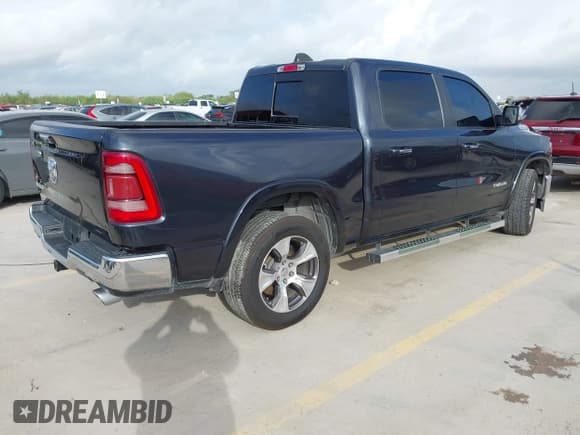 ✅ 2021 Ram 1500 Laramie • VIN: 1C6RREJT4MN821315 • Lot: 42528986. Listed on IAAI with 88,959 mi. Free auction sales archive from the USA and detailed vehicle history report at DreamBid. Image 4.