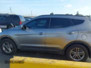 ✅ 2017 Hyundai Santa Fe 2.4L • VIN: 5NMZU3LB1HH012955 • Lot: 43634021. Listed on IAAI with 75,051 mi. Free auction sales archive from the USA and detailed vehicle history report at DreamBid. Image 15.