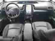 2021 Toyota Prius LE с VIN JTDKAMFP1M3167098, выставлен на аукционе Copart как лот 66352335 с пробегом 167 068 миль миль и Списание • Salvage title. История ставок и продаж доступна на DreamBid. Изображение 8.