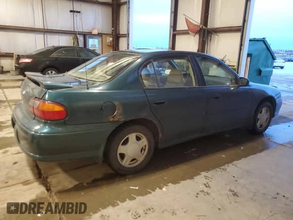 2000 Chevrolet Malibu LS with VIN 1G1NE52J9Y6223472, listed as a Copart auction lot 84031724 with 230,453 mi miles and Clean title. Bid and sale history available at DreamBid. Image 3.