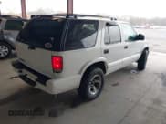 ✅ 2004 Chevrolet Blazer LS • VIN: 1GNDT13X64K129093 • Lot: 41860109. Wystawiony na IAAI z przebiegiem 175 588 mil. Bezpłatny archiwum sprzedaży aukcyjnych z USA i szczegółowy raport historii pojazdu na DreamBid. Zdjęcie 4.