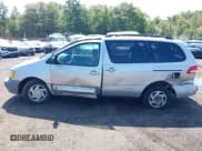 ✅ 2003 Toyota Sienna LE • VIN: 4T3ZF13C43U535740 • Lot: 43160504. Listed on IAAI with 133,134 mi. Free auction sales archive from the USA and detailed vehicle history report at DreamBid. Image 14.