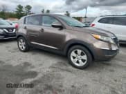 ✅ 2012 Kia Sportage LX • VIN: KNDPB3A28C7310712 • Lot: 91927855. Wystawiony na Copart z przebiegiem 147 839 mil. Bezpłatny archiwum sprzedaży aukcyjnych z USA i szczegółowy raport historii pojazdu na DreamBid. Zdjęcie 4.