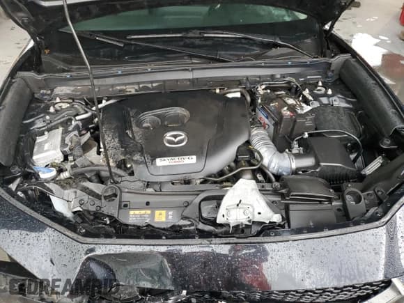 ✅ 2022 Mazda CX-30 2.5 Turbo • VIN: 3MVDMBAY3NM458995 • Lot: 60783645. Listed on Copart with 45,618 mi. Free auction sales archive from the USA and detailed vehicle history report at DreamBid. Image 12.