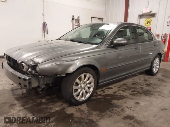 ✅ 2003 Jaguar X-Type 2.5L Manual • VIN: SAJEA51D33XD13416 • Lot: 43210908. Listed on IAAI with 195,057 mi. Free auction sales archive from the USA and detailed vehicle history report at DreamBid. Image 17.