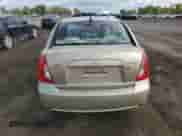 2010 Hyundai Accent GL z VIN KMHCN4BC4AU494057, wystawiony jako Copart lot #72675014 z przebiegiem 61 711 mil mil oraz Szkoda całkowita • Salvage title. Historia ofert i sprzedaży dostępna na DreamBid. Obrazek 6.