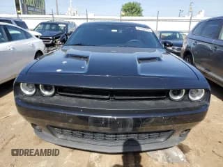 ✅ 2021 Dodge Challenger SXT • VIN: 2C3CDZGG1MH552864 • Lot: 57020974. Wystawiony na Copart z przebiegiem 67 640 mil. Bezpłatny archiwum sprzedaży aukcyjnych z USA i szczegółowy raport historii pojazdu na DreamBid. Zdjęcie 5.