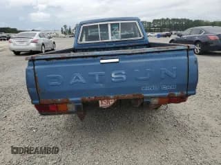 ✅ 1981 Datsun 720 • VIN: JN6MD06S9BW022929 • Lot: 73064384. Wystawiony na Copart z przebiegiem 389 743 mil. Bezpłatny archiwum sprzedaży aukcyjnych z USA i szczegółowy raport historii pojazdu na DreamBid. Zdjęcie 6.