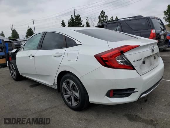 ✅ 2020 Honda Civic LX • VIN: 2HGFC2F60LH557081 • Lot: 81884475. Listed on Copart with 32,163 mi. Free auction sales archive from the USA and detailed vehicle history report at DreamBid. Image 2.