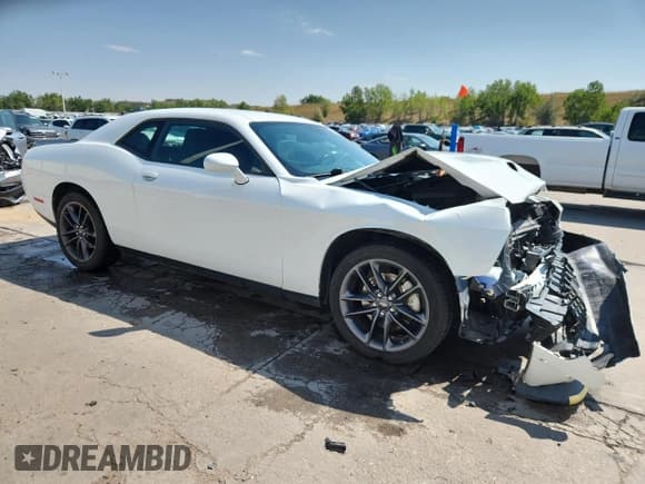 ✅ 2021 Dodge Challenger GT • VIN: 2C3CDZKGXMH677580 • Lot: 71127975. Listed on Copart with 76,932 mi. Free auction sales archive from the USA and detailed vehicle history report at DreamBid. Image 4.