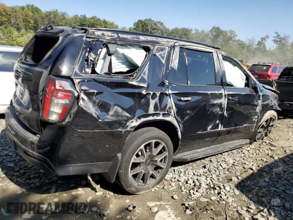 2021 Chevrolet Tahoe RST with VIN 1GNSKRKT6MR420062, listed as a Copart auction lot 74708984 with 49,551 mi miles and Salvage title. Bid and sale history available at DreamBid. Image 3.