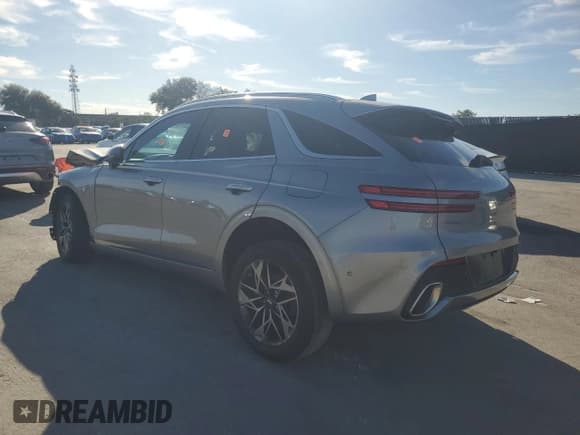 ✅ 2022 Genesis GV70 2.5T • VIN: KMUMADTB2NU046591 • Лот: 89882795. Опубликован ранее на Copart с пробегом Не указан. Бесплатный доступ к архиву аукционных продаж из США и подробный отчёт об истории автомобиля на DreamBid. Изображение 2.