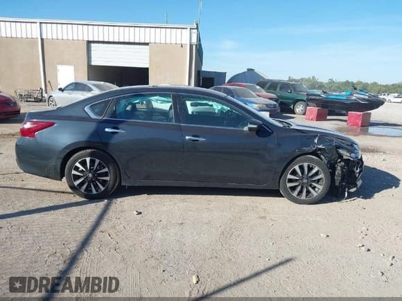 ✅ 2018 Nissan Altima S • VIN: 1N4AL3APXJC202648 • Лот: 42628634. Опубликован ранее на IAAI с пробегом 129 601 миль. Бесплатный доступ к архиву аукционных продаж из США и подробный отчёт об истории автомобиля на DreamBid. Изображение 13.