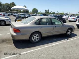 ✅ 1998 Toyota Avalon XL • VIN: 4T1BF18B1WU254607 • Лот: 67297074. Опубликован ранее на Copart с пробегом 158 658 миль. Бесплатный доступ к архиву аукционных продаж из США и подробный отчёт об истории автомобиля на DreamBid. Изображение 3.