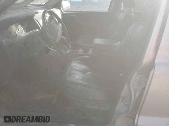 ✅ 2004 Jeep Grand Cherokee Laredo • VIN: 1J4GW48N34C240386 • Lot: 91720365. Wystawiony na Copart z przebiegiem 195 102 mil. Bezpłatny archiwum sprzedaży aukcyjnych z USA i szczegółowy raport historii pojazdu na DreamBid. Zdjęcie 7.